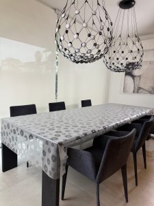 Tovaglia in PVC con effetto cristallo su margherite