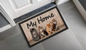 zerbino stampato con immagine di 4 gattini e scritta "My Home"